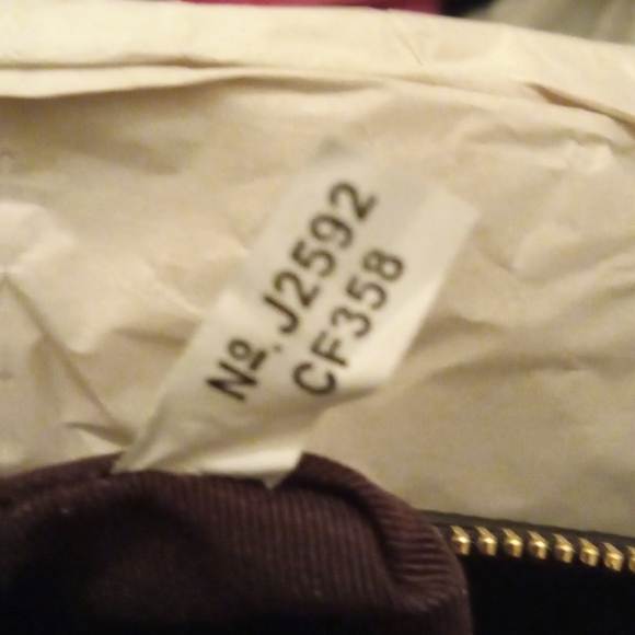 Coach Black Embossed Signature C Leather Wristlet 2 Charms NWT - Picture 9 of 9